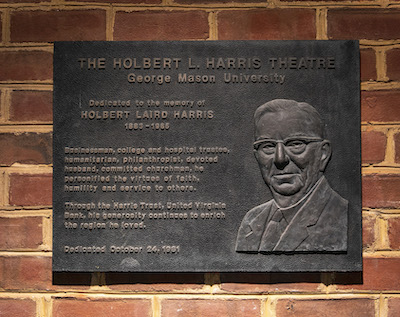 plaque inside Harris Theatre with Harris likeness