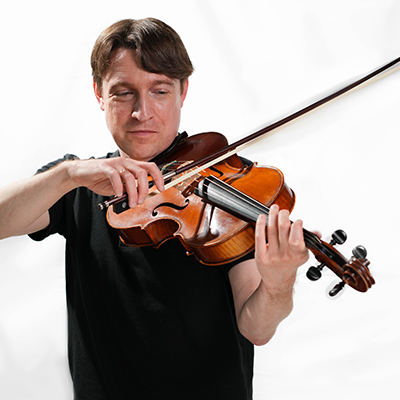 Patrick wearing black shirt holding his viola