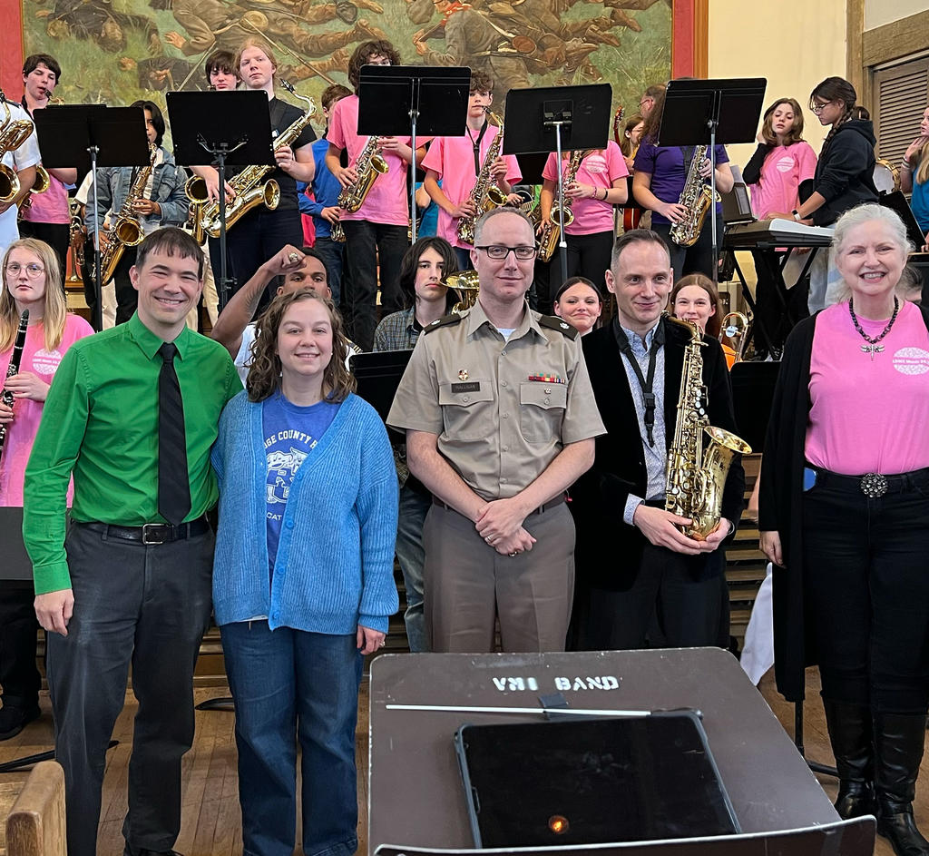 Group of musicians of all ages standing together at VMI