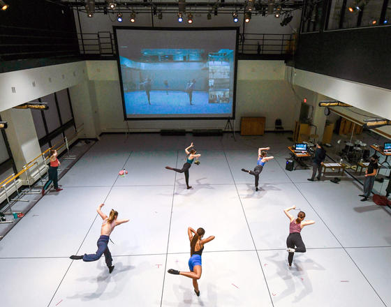 School of Dance class being taught simultaneously in person and virtually. Serving students who are on campus as well as remote learners.